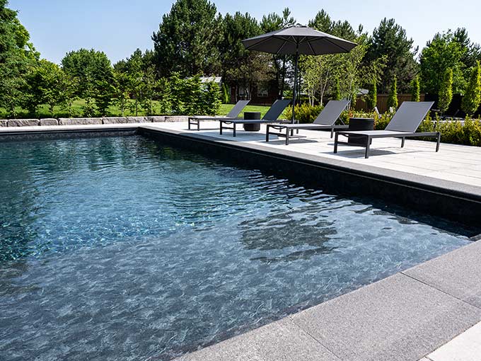 Pool coping and interlock walkways with ambient lighting