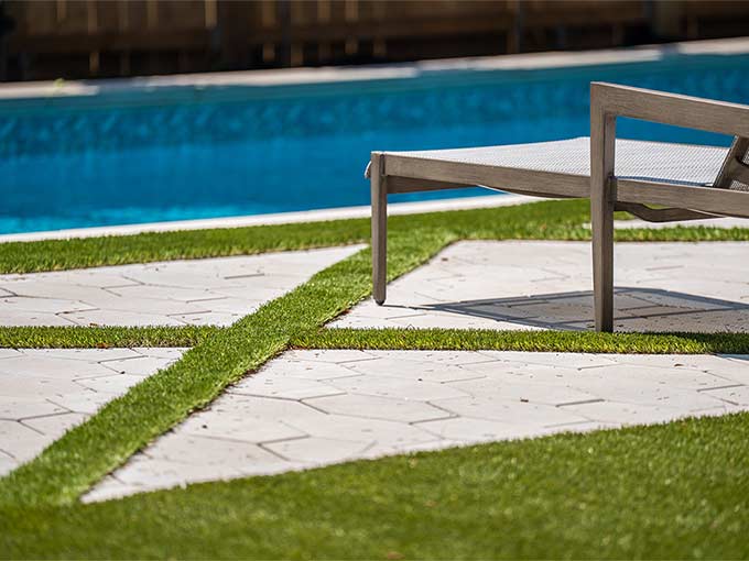 Luxury landscape design with pool and interlock patio